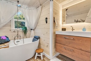 Combined shower/tub, hair dryer, towels, soap - Lotus Spa, your home away from home (Acton)