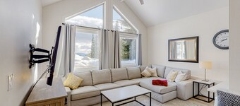 Ski-in/out condo with mountain view, wifi, fireplace, & private washer/dryer