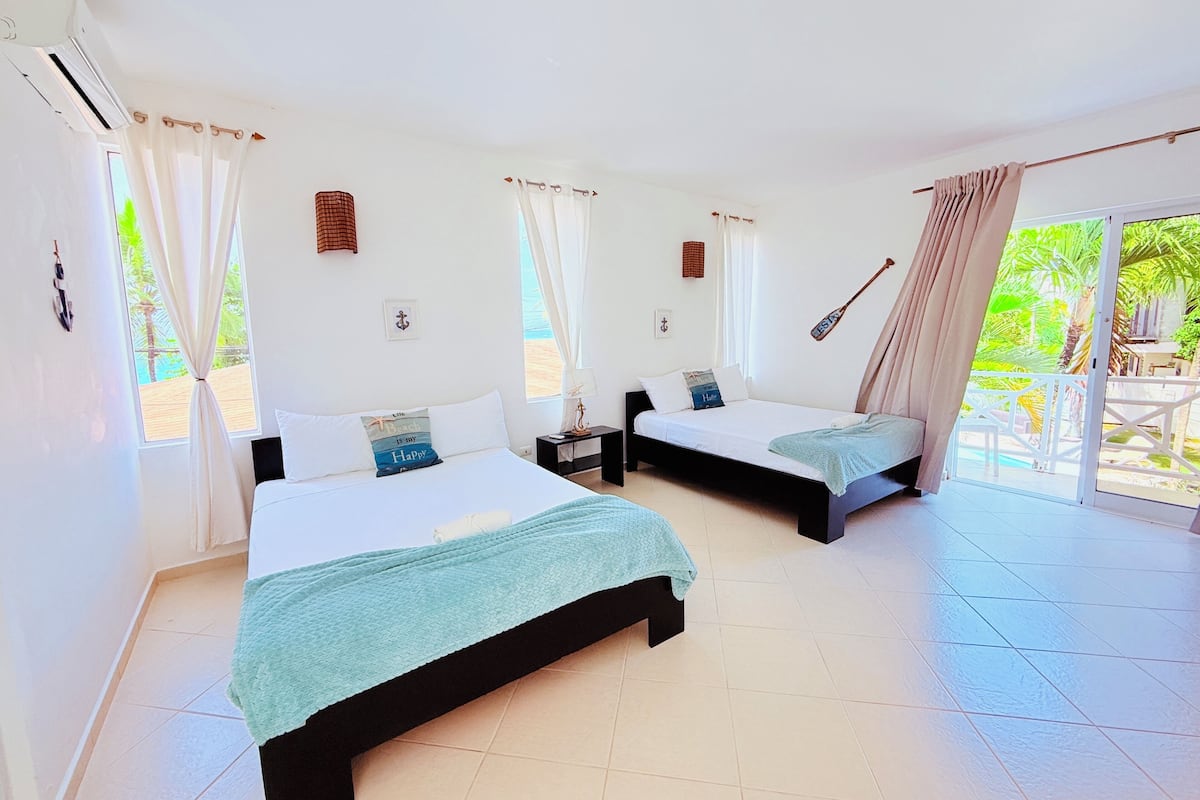 Signature Quadruple Room, 2 Queen Beds | Iron/ironing board, WiFi (free), bed sheets