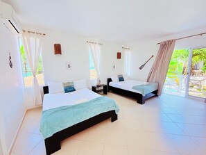 Signature Quadruple Room, 2 Queen Beds | Iron/ironing board, free WiFi, bed sheets