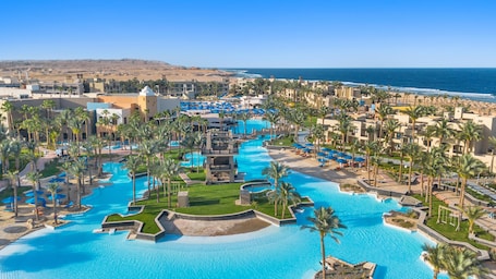 2 outdoor pools, lifeguards on site