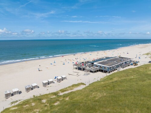 Bungalow at Sea (800 meters) with (unique) beach house on the beach