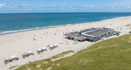 Bungalow at Sea (800 meters) with (unique) beach house on the beach