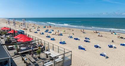 Bungalow at Sea (800 meters) with (unique) beach house on the beach