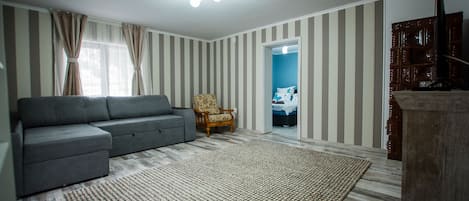 House | Living room | 30-inch TV with digital channels