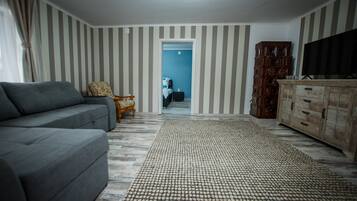 House | Living room | 30-inch TV with digital channels