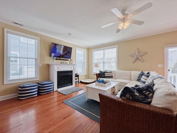 Smart TV, fireplace, books