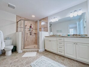 Combined shower/tub, hair dryer, towels, toilet paper