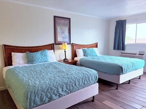 Room, 2 Queen Beds, Non Smoking | Individually decorated, individually furnished, desk, laptop workspace