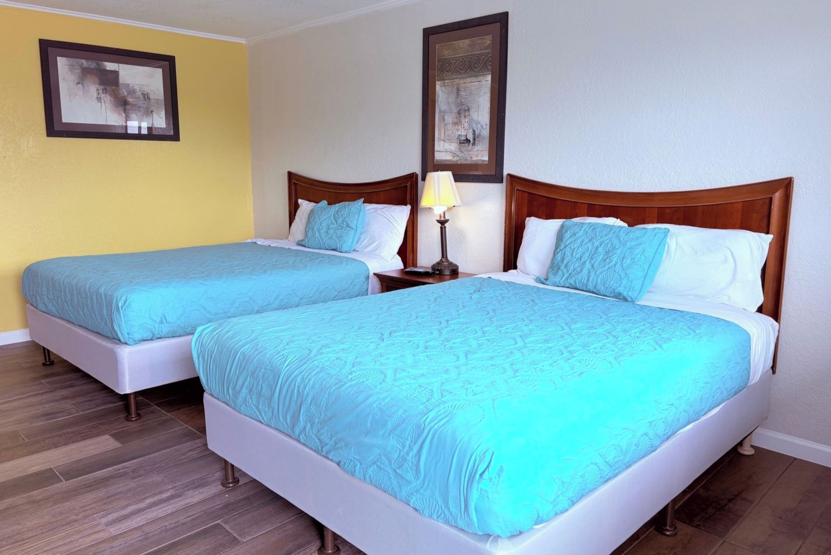 Room, 2 Queen Beds, Non Smoking | Individually decorated, individually furnished, desk, laptop workspace