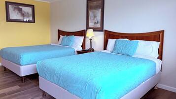 Room, 2 Queen Beds, Non Smoking | Individually decorated, individually furnished, desk, laptop workspace