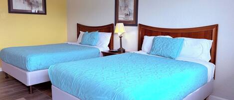 Room, 2 Queen Beds, Non Smoking | Individually decorated, individually furnished, desk, laptop workspace