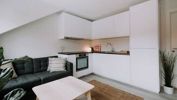 Premium Apartment | Living area | 125-cm Smart TV with digital channels, TV, Netflix