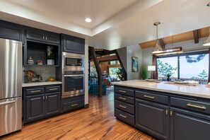 Fridge, microwave, oven, stovetop - A-Framed Lifestyle Cabin - Where mid-century luxury meets the sky! (Crestline)