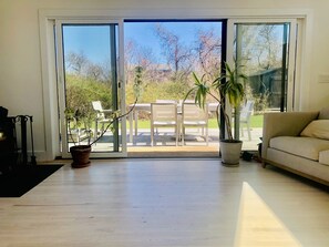 Relax in this inviting living space with a patio area offering a serene view.