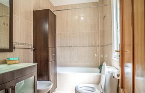 Bañera y secador de pelo