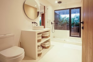 Bathtub, towels, soap