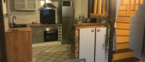 Refrigerador, microondas, horno y parrilla de estufa