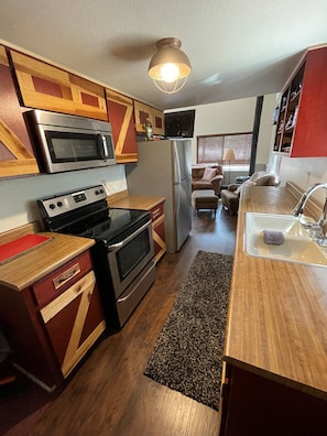 Kitchen, view towards the living room
