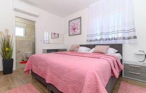 2 bedrooms, iron/ironing board, travel crib, free WiFi