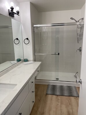 Shower, towels, toilet paper