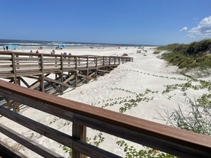A wooden boardwalk leading to a sandy beach with sparse vegetation. - 🌴Little Paradise 🌴w/heated pool in PALM COAST Florida (Palm Coast)