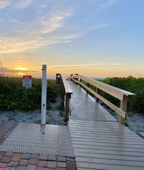 Shower to wash off sand next to the bridge walkway to the beach