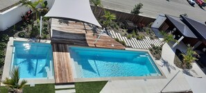 Outdoor pool, a heated pool - Sun, sea and sand.  Brand new Ocean View apartment! (Tahunanui)