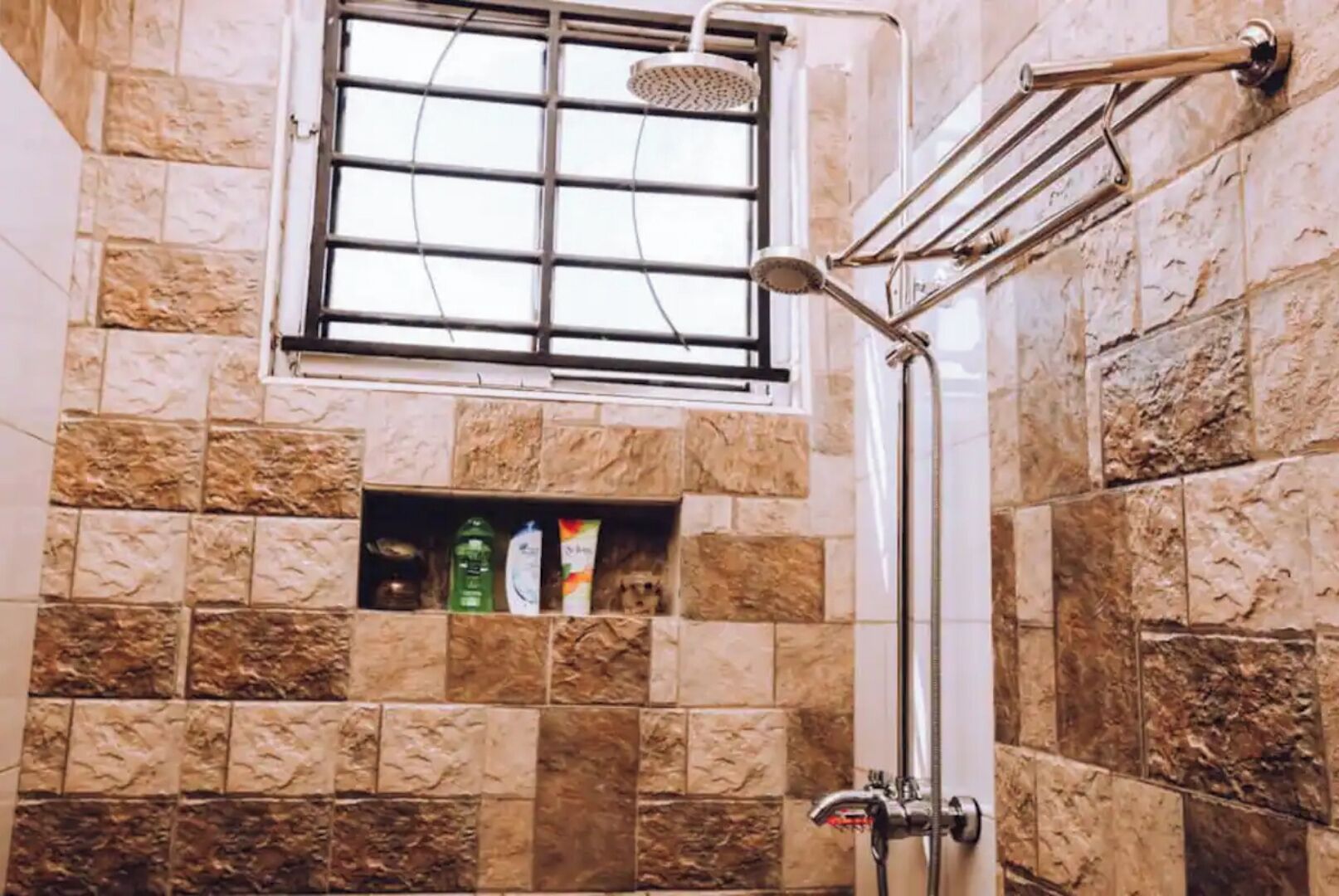 Shower, towels, soap, toilet paper
