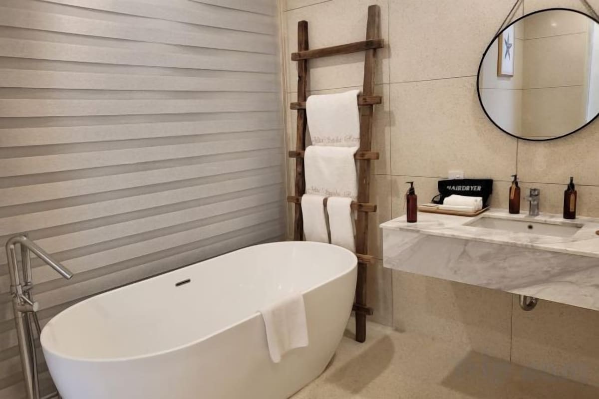Bathroom | Separate tub and shower, rainfall showerhead, hair dryer, bathrobes