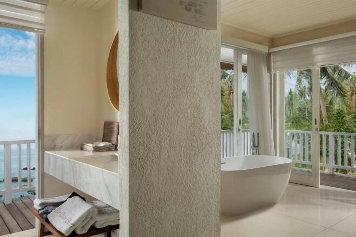 Bathroom | Separate tub and shower, rainfall showerhead, hair dryer, bathrobes