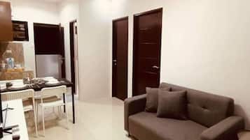 Departamento, 2 habitaciones | Área de sala de estar