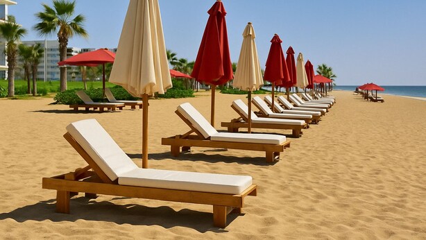 A beach with rows of sun loungers and beach umbrellas. - Porto Said Tourist Resort n5 (Al-Manasrah)