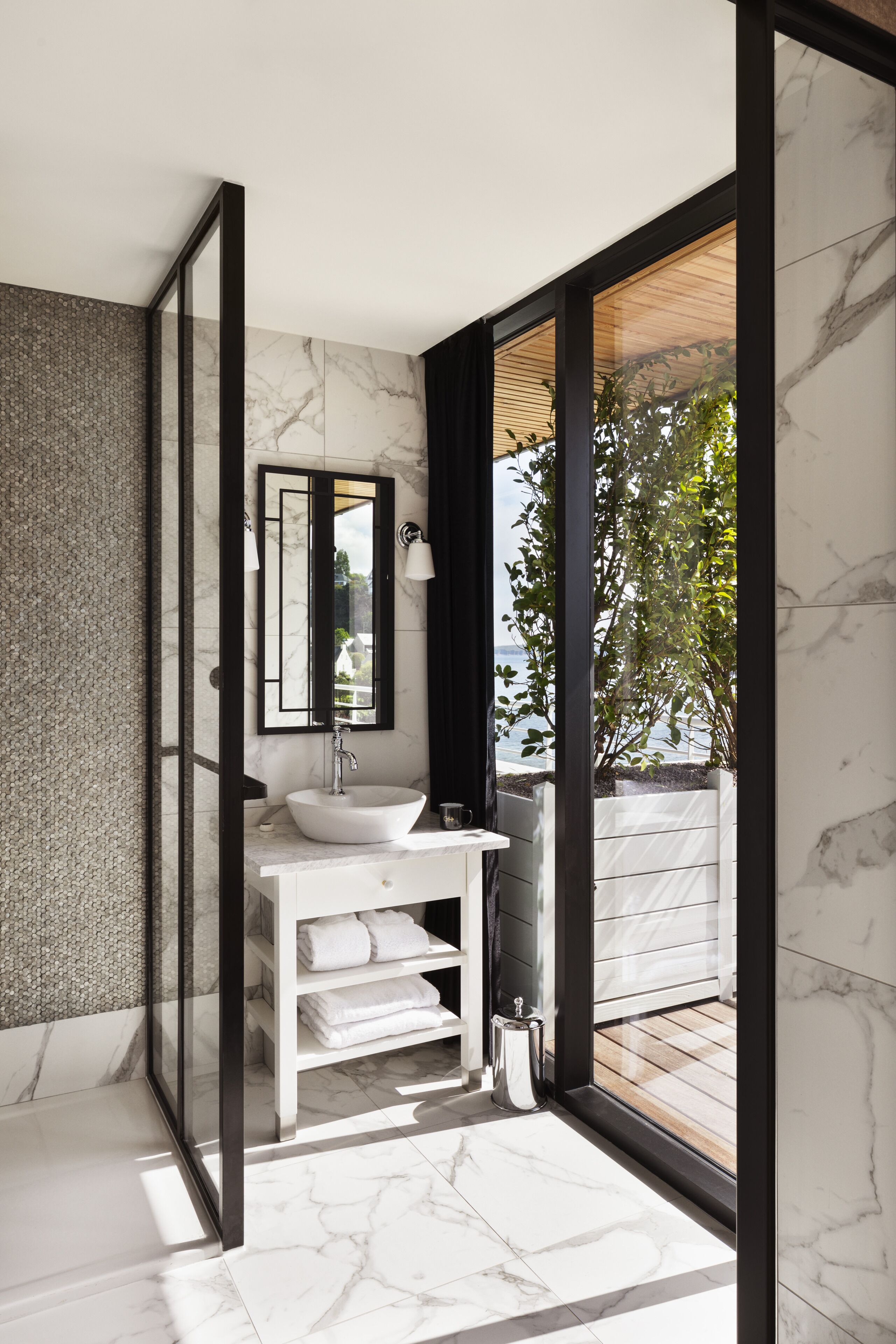 panoramic room, partial sea view | bathroom | hair dryer, bathrobes, towels