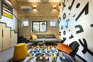 Family Room | Living area | 32-inch Smart TV with digital channels, TV, Netflix - Pixel Dizengoff Square - Smart Hotel by Loginn Tel Aviv (Tel Aviv)