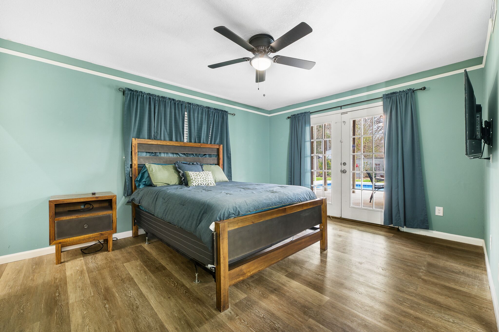 Modern home with swimming pool and hot tub