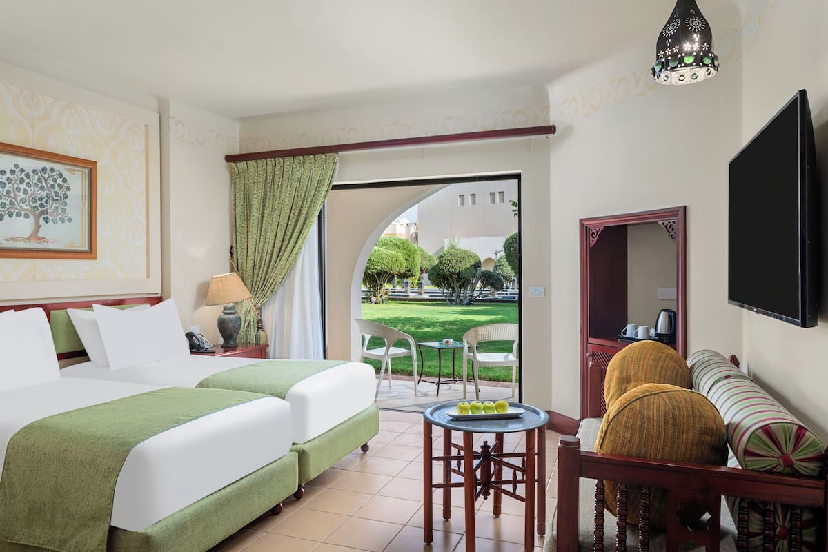 family room, 2 bedrooms | 1 bedroom, minibar, individually decorated, individually furnished