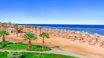 Private beach, beach umbrellas, beach towels, beach bar