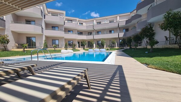 Seasonal outdoor pool, sun loungers