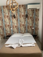 Habitación económica | Caja fuerte, wifi gratis, ropa de cama