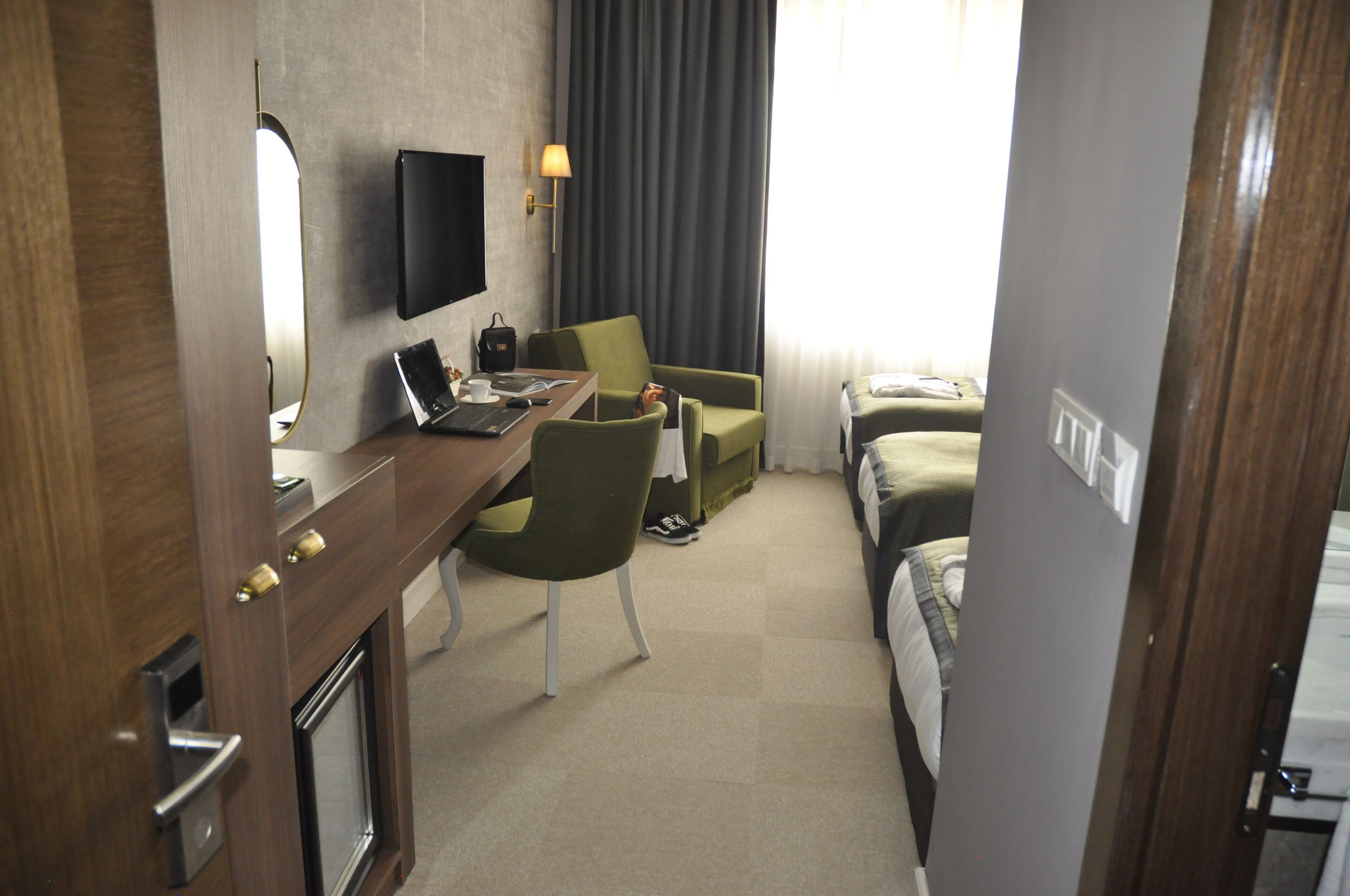 standard triple room | egyptian cotton sheets, premium bedding, free minibar, laptop workspace