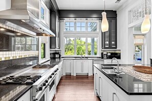 Fridge, microwave, oven, stovetop - Park District Elegance: WaterColor Home, Beach Club Passes, Private Pool, Bikes, Outdoor Oasis! (Santa Rosa Beach)