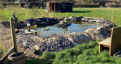 Cabin to rent in five acres of landscape backing onto country park
