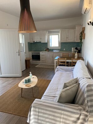 Villa | Private kitchen | Fridge, microwave, oven, stovetop