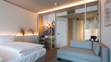 Superior Double Room, Balcony | Living area | 43-inch flat-screen TV with satellite channels, TV