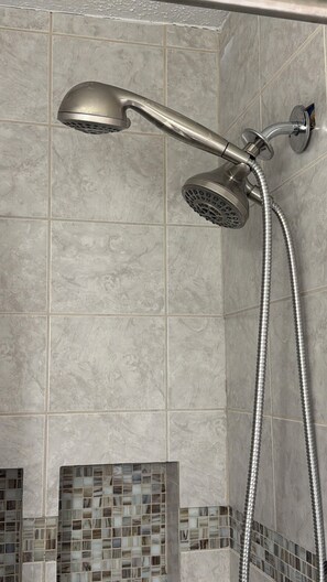 Combined shower/tub, hair dryer, towels, soap