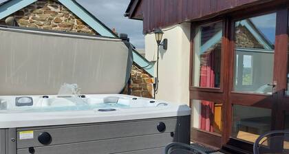 Converted barn with hot tub in north devon