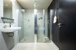 Family Quadruple Room, 1 Bedroom, Balcony | Bathroom | Shower, hair dryer, heated floors, soap