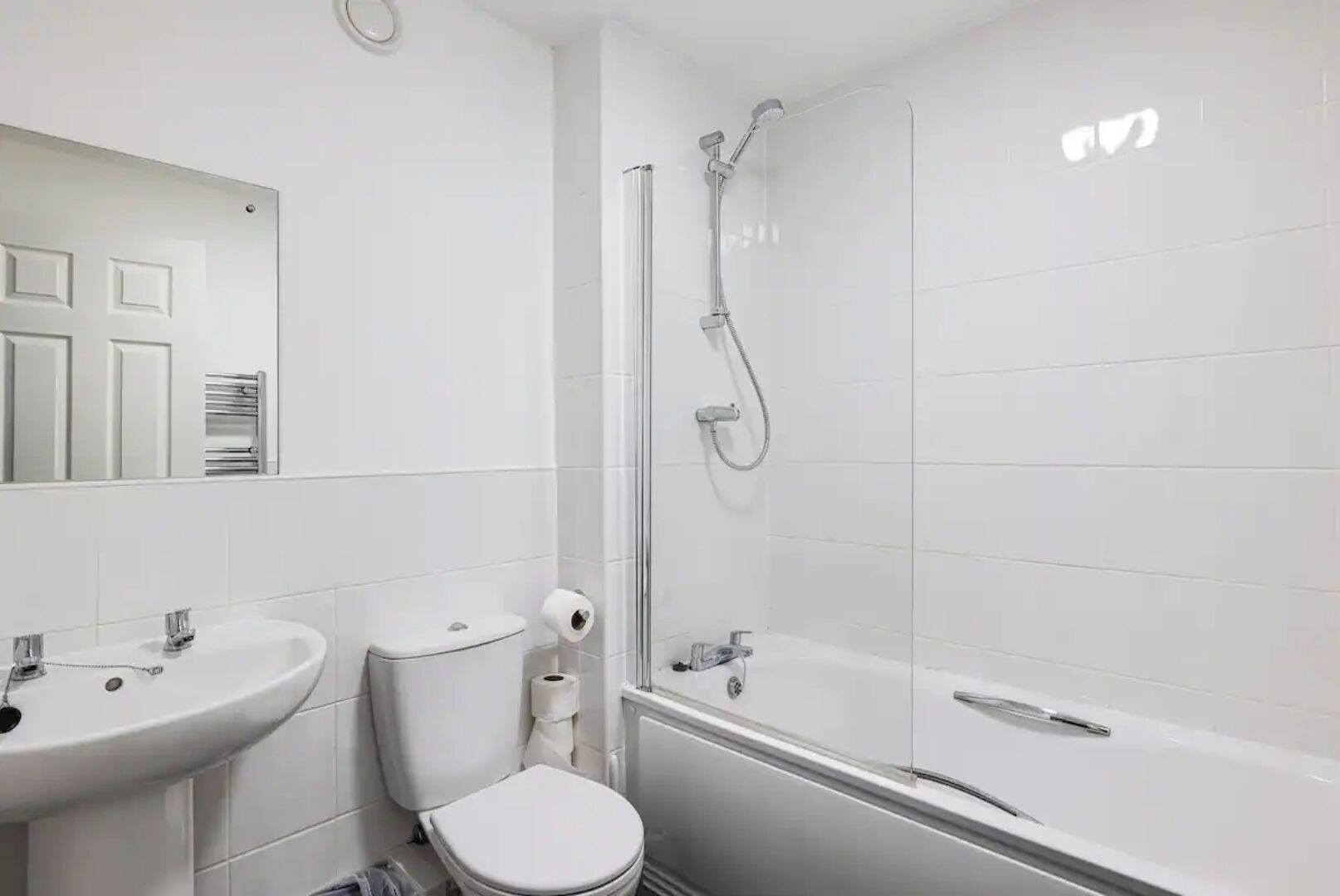 Bathtub, hair dryer, towels, soap