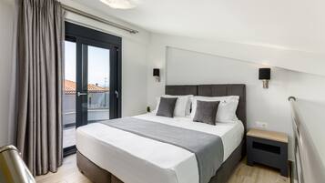 Suite familiar | Caja de seguridad en la habitación, wifi gratis y ropa de cama
